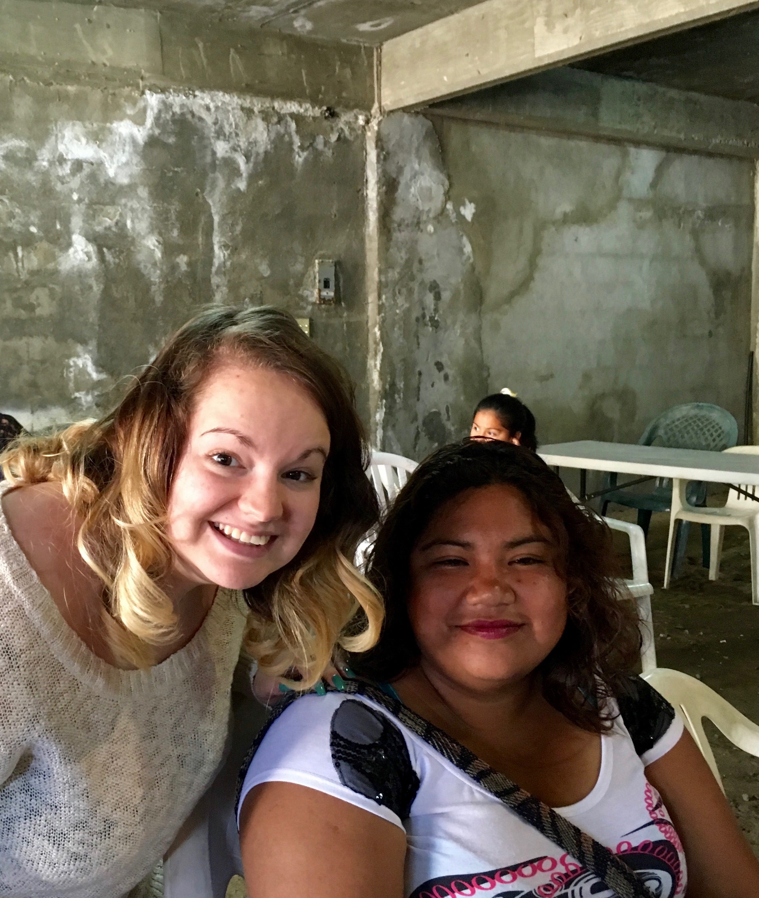 Hannah with one of the women from the clinic that she led in prayer
